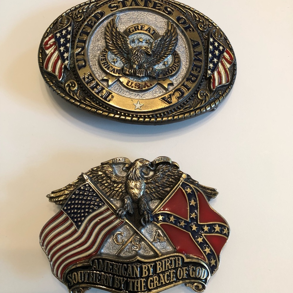 Two men’s belt buckles